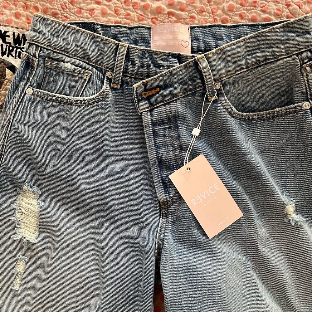 Revice crossed waistband button fly jeans